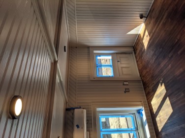 mezzanine windows with finished paint and flooring